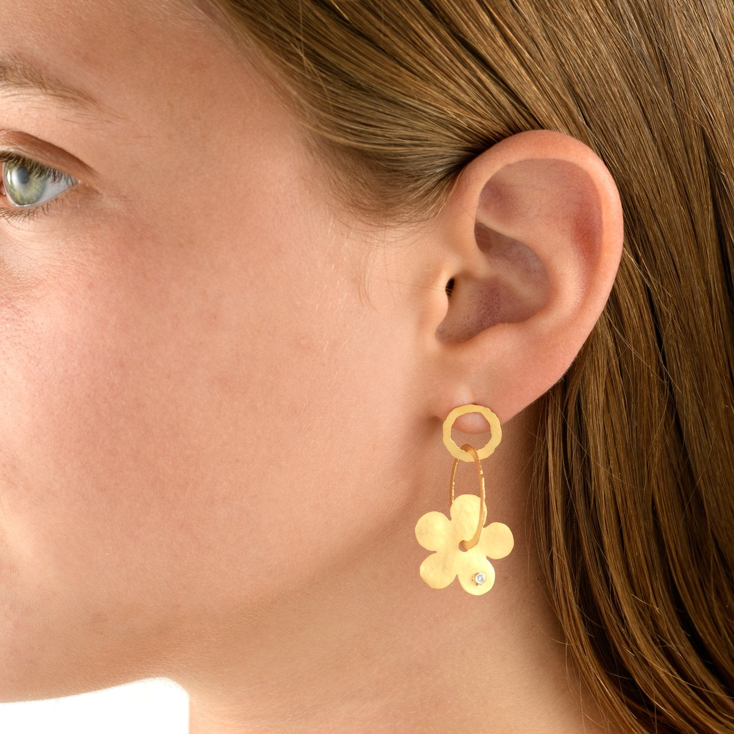 2409 - 14kt yellow gold dangling earring, textured matte finish with diamonds. post and friction back.