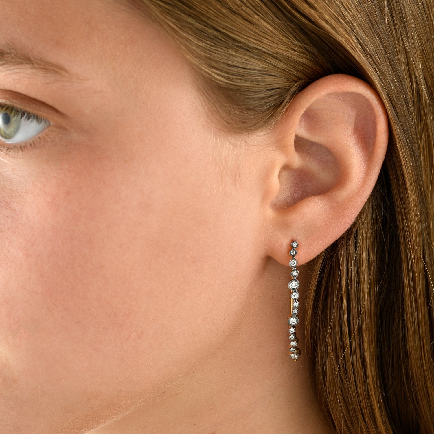 6604 - 14kt yellow gold diamond hoop earring with black rhodium