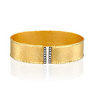7144 - 14kt yellow gold hammered with torched edges cuff bracelet, white diamonds & black rhodium.