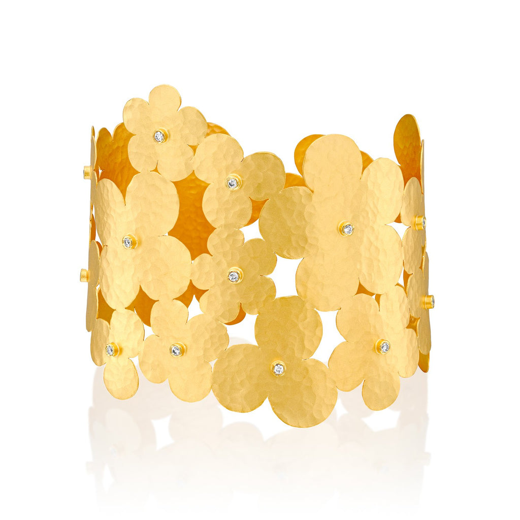 1779 - 14kt yellow gold matte hammered flower cuff bracelet, enhanced with .26cttw of bezel set diamonds