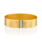 7144 - 14kt yellow gold hammered with torched edges cuff bracelet, white diamonds & black rhodium. 