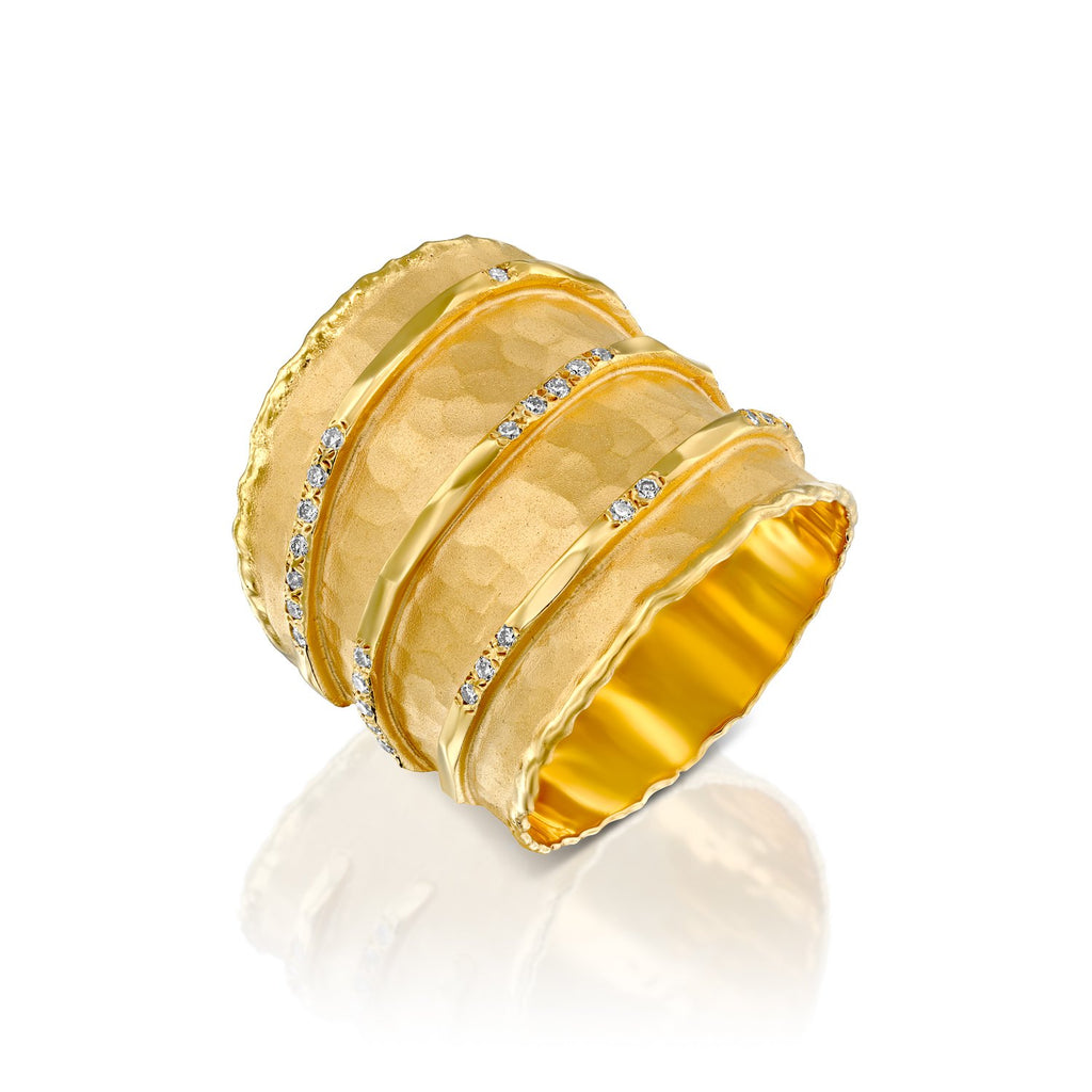7362 - 14kt yellow hammered gold ring, with three shiny gold rows set with .16cttw white diamonds.
