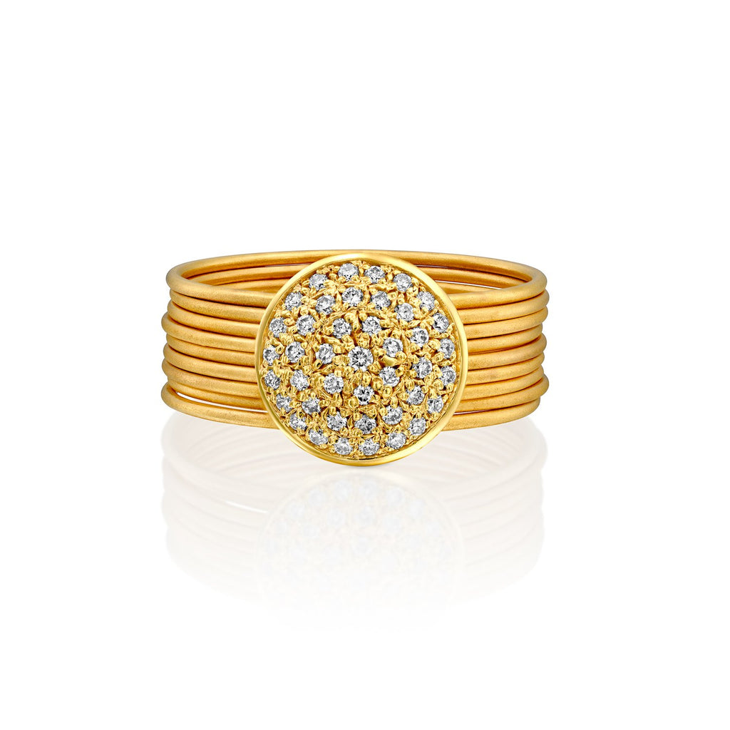 D5961A - nine stackable band rings in 14kt yellow gold matte satin finish, connected to a 10mm round white diamond pave disc.